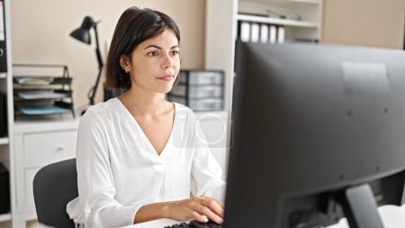Photo for Young beautiful hispanic woman business worker using computer working at office - Royalty Free Image