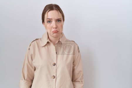 Photo for Young caucasian woman wearing casual shirt depressed and worry for distress, crying angry and afraid. sad expression. - Royalty Free Image