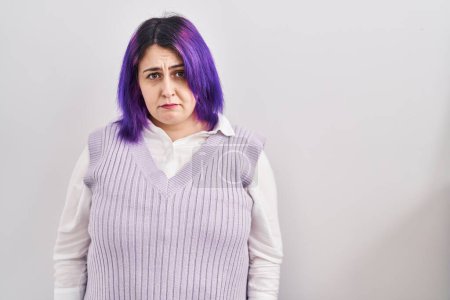 Photo for Plus size woman wit purple hair standing over white background depressed and worry for distress, crying angry and afraid. sad expression. - Royalty Free Image