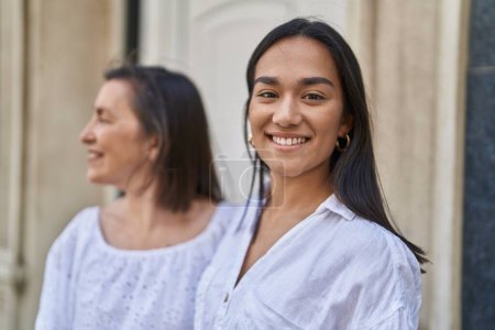 Photo for Two women mother and daughter smiling confident standing together at street - Royalty Free Image