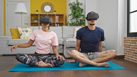 Photo for Man and woman couple training with virtual reality glasses at street - Royalty Free Image