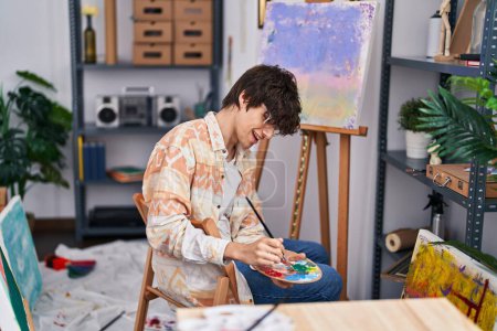 Photo for Young hispanic man artist smiling confident drawing at art studio - Royalty Free Image