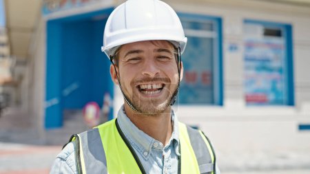 Photo for Young caucasian man architect smiling confident standing at construction place - Royalty Free Image