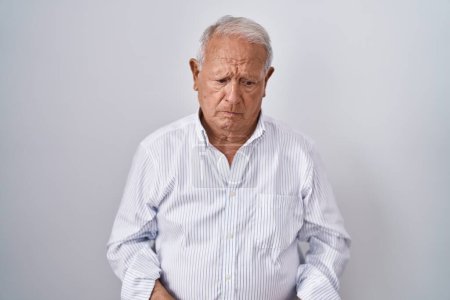 Photo for Senior man with grey hair standing over isolated background depressed and worry for distress, crying angry and afraid. sad expression. - Royalty Free Image