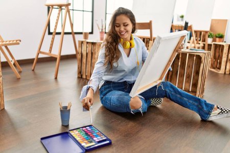 Photo for Young beautiful hispanic woman artist smiling confident drawing at art studio - Royalty Free Image