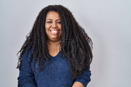 Photo for Plus size hispanic woman standing over white background with a happy and cool smile on face. lucky person. - Royalty Free Image