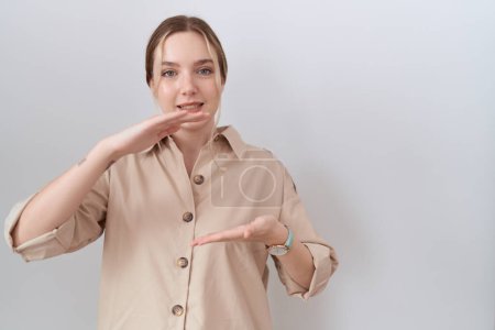 Photo for Young caucasian woman wearing casual shirt gesturing with hands showing big and large size sign, measure symbol. smiling looking at the camera. measuring concept. - Royalty Free Image