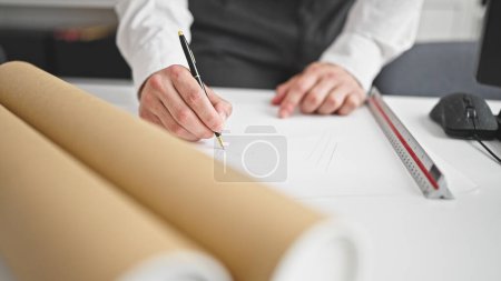Photo for Young hispanic man architect drawing house plans at office - Royalty Free Image