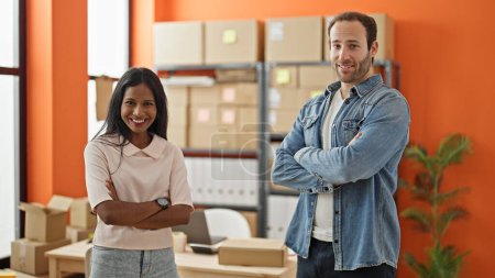 Photo for Two workers man and woman standing with arms crossed gesture smiling at office - Royalty Free Image