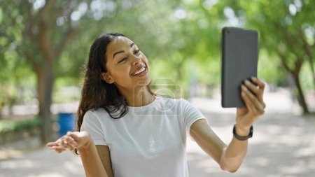 Téléchargez les photos : African american woman smiling confident having video call at park - en image libre de droit
