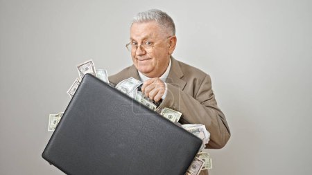 Photo for Middle age grey-haired man business worker holding briefcase with dollars smiling over isolated white background - Royalty Free Image