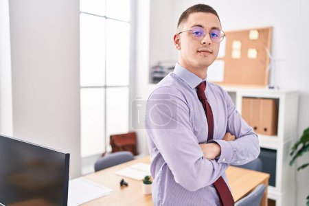 Photo for Young hispanic man business worker standing with arms crossed gesture at office - Royalty Free Image