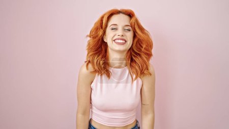 Photo for Young redhead woman smiling confident standing over isolated pink background - Royalty Free Image