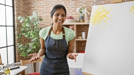 Photo for Young latin woman artist smiling confident drawing at art studio - Royalty Free Image