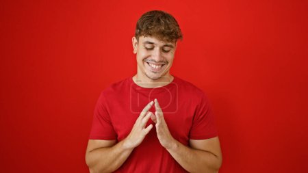 Photo for Young hispanic man smiling confident with hands together over isolated red background - Royalty Free Image