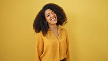 Photo for African american woman smiling confident standing over isolated yellow background - Royalty Free Image