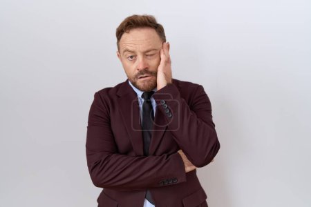Photo for Middle age business man with beard wearing suit and tie thinking looking tired and bored with depression problems with crossed arms. - Royalty Free Image