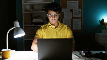 Photo for Young latin man business worker using laptop working at the office - Royalty Free Image