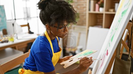 Photo for African american woman artist drawing at art studio - Royalty Free Image