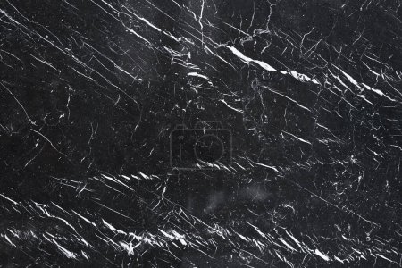 Téléchargez les photos : Texture d'une surface en marbre noir - en image libre de droit