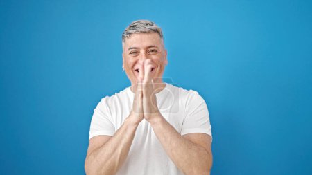 Photo for Young caucasian man smiling confident clapping over isolated blue background - Royalty Free Image