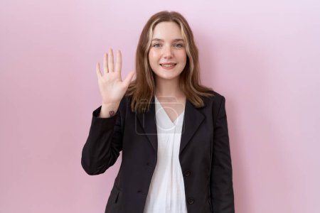 Photo for Young caucasian business woman wearing black jacket showing and pointing up with fingers number five while smiling confident and happy. - Royalty Free Image