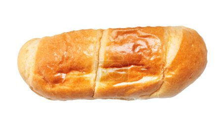 Gros plan d'un pain isolé fraîchement cuit, mettant en valeur sa croûte dorée et sa texture douce.