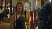 Smiling woman shopping in traditional souk madinat jumeirah, dubai puzzle #703148002