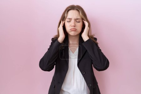 Photo for Young caucasian business woman wearing black jacket with hand on head, headache because stress. suffering migraine. - Royalty Free Image