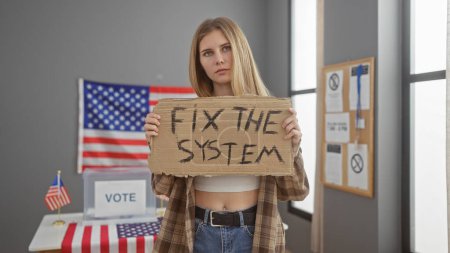 Young woman holding a 'fix the system' sign in a usa electoral college room, portraying activism