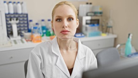 A professional young woman in a laboratory setting surrounded by scientific equipment, portraying a medical or research concept.