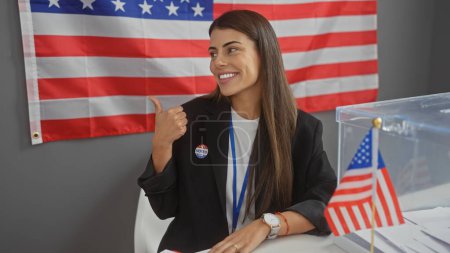 Hispanic woman thumbs-up american flag interior college vote