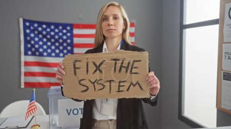 Caucasian woman holding protest sign indoors with american flag at electoral setting