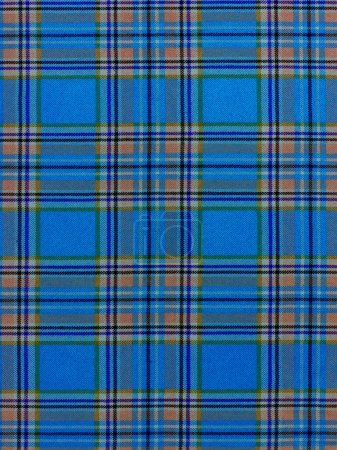 Foto de Tejido escocés típico de alta resolución con fondo azul - Imagen libre de derechos