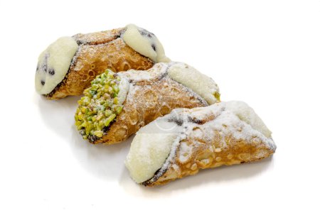 Photo for Three sicilian cannoli with different tastes, isolated on white background with shadow - Royalty Free Image