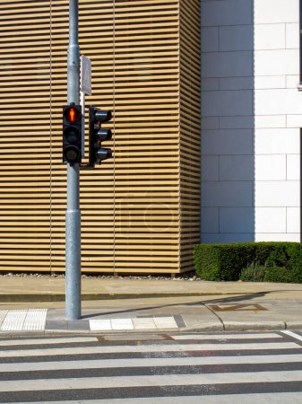 Photo for Traffic light, urban detail with architectural detail background - Royalty Free Image