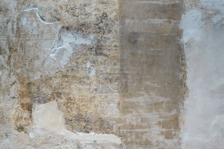 Foto de Pared rústica - fondo de materia prima hecha con cemento, piedras y ladrillos - Imagen libre de derechos