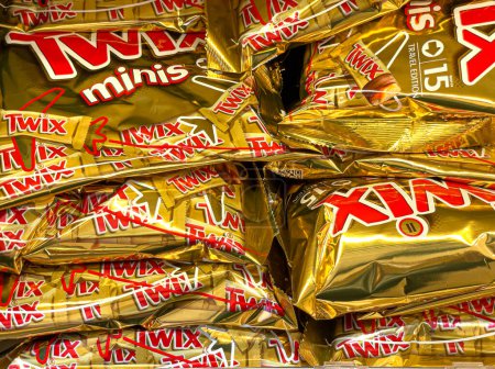 Photo for Roma, Italy, 20 December 2023: Close-up of Twix minis candy bars on a shelf in a store in the Duty Free store at Rome Fiumicino Airport. - Royalty Free Image