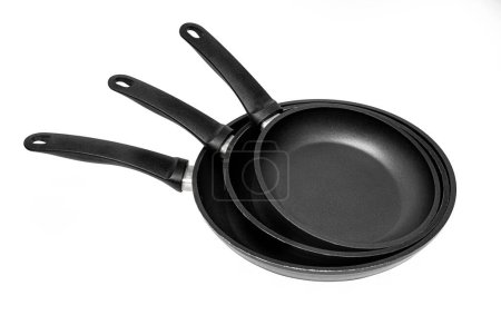 bbq frying pan with wooden handle isolated on white background with clipping path