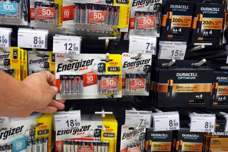 Photo for WALLONIA, BELGIUM  AUGUST 2022: Display Energizer and Duracell brand multi packs Batteries in a Carrefour hypermarket. - Royalty Free Image