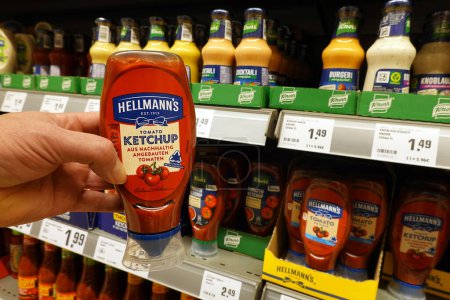 Photo for GERMANY - JANUARY 2024: Plastic bottle of Hellmans brand tomato ketchup in a REWE supermarket. Hellmann's and Best Foods are American brand names owned by Unilever - Royalty Free Image