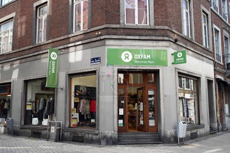 Photo for LIEGE, WALLONIA, BELGIUM - SEPTEMBER 2023: Oxfam charity shop. Oxfam is an international non-governmental organization - Royalty Free Image