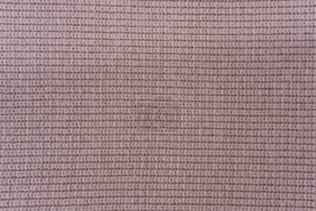 Photo for Knitted fabric texture. Close up of a woolen knitted fabric - Royalty Free Image