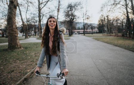 A cheerful business lady with a bicycle in the park, showcasing an active and eco-friendly lifestyle.