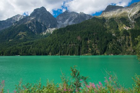 View of Lake antholz, a beautiful lake with emerald water in South Tyrol, Italy