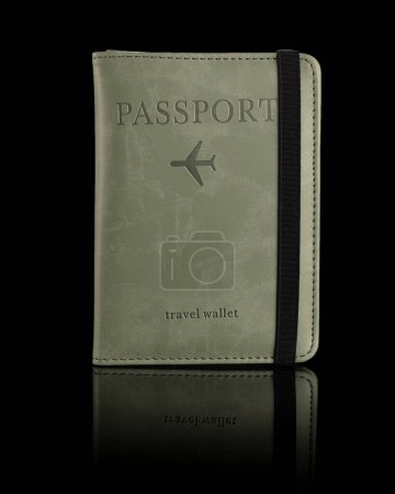 Photo for Passport cover made of decorative material with passport elastic band on black background with reflection - Royalty Free Image