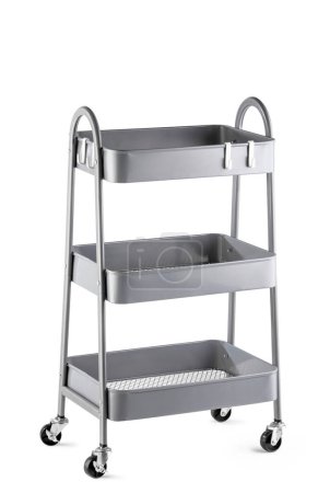 Photo for Functional gray metal cart with three tiers of large baskets, convenient handles and swivel wheels, designed for easy transportation and storage of items, ideal for organizing home and office space - Royalty Free Image