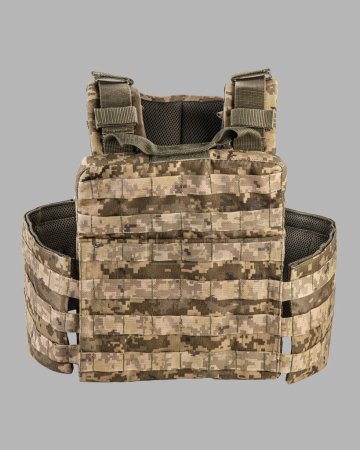 Photo for Detailed view of modern camouflage military tactical vest with MOLLE system, multiple pouches, and heavy-duty buckles, isolated on grey background - Royalty Free Image