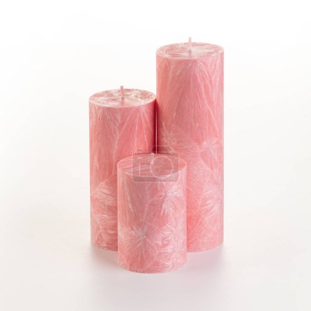 Photo for Two artisan pink palm wax candles, perfect for daily comfort and excellent gift choice, presented against white background - Royalty Free Image