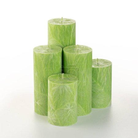 Photo for Natural green palm wax pillar candles of varying heights, featuring unique ice pattern texture grouped on white background. Handmade accessories for refreshing interior decor - Royalty Free Image